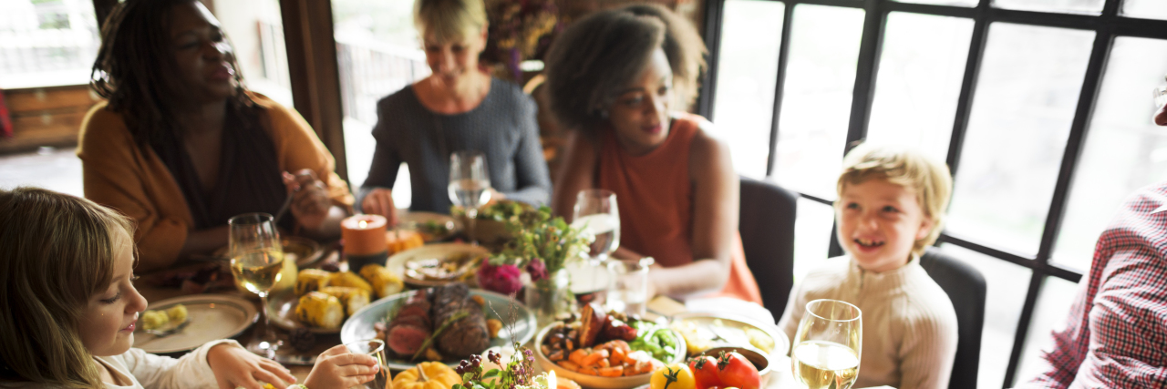 Avoiding Stress at Family Gatherings With a Child With a Disability Family celebrating Thanksgiving Holiday.