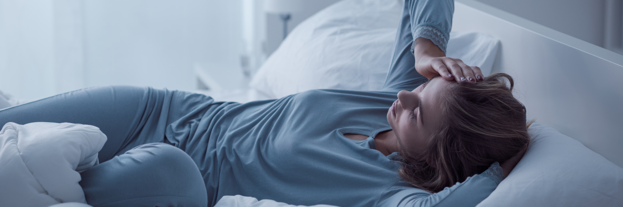 When Crohn's Made Me Too Sick to Enjoy Thanksgiving Dinner Woman sick in bed.