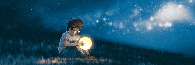 Boy with a little moon in his hands.