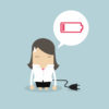 Business woman with low battery - illustration