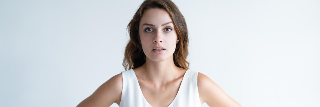 Why You Shouldn't Judge My PTSD If You Don't Have It Woman standing with hands on her hips