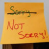 image a post-it note that has "sorry" crossed off and "not sorry" written underneath