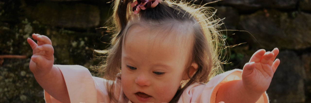 Kelly's daughter playing outside.