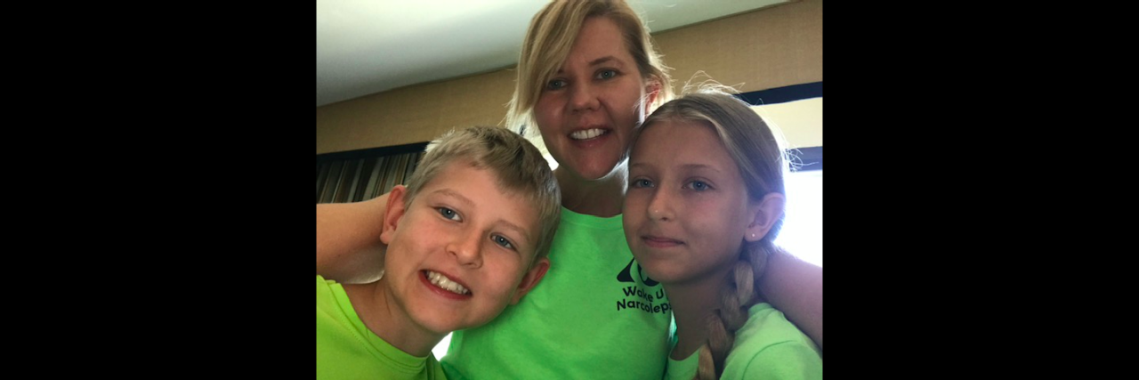 A Metaphor for When Your Child Receives a Life-Changing Diagnosis Mother with her two children smiling at the camera