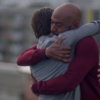 screenshot of a million little things episode showing characters rome and PJ hugging