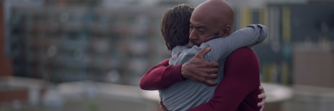 How Midseason Finale of 'A Million Little Things' Deals With Suicide screenshot of a million little things episode showing characters rome and PJ hugging