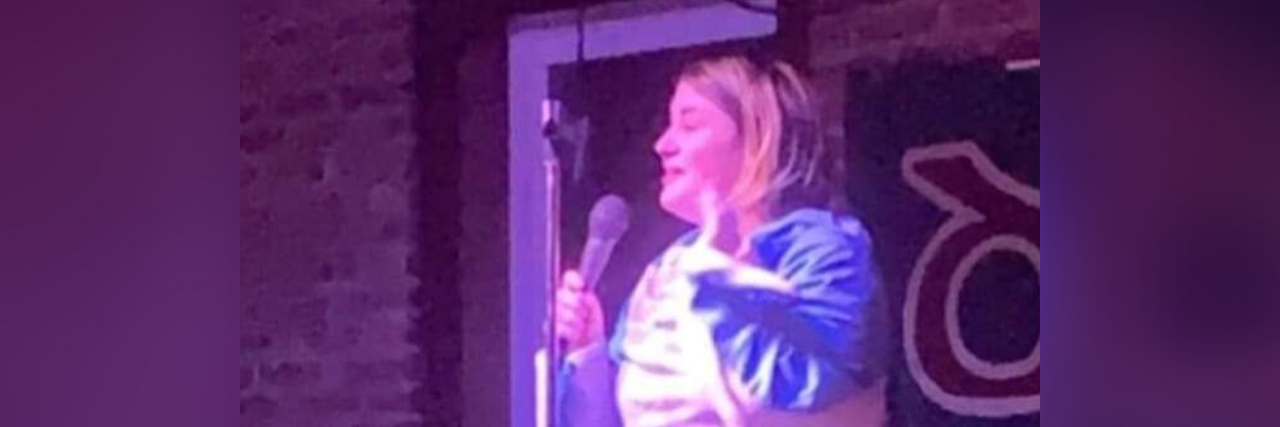 Becoming a Comedian as Someone on the Autism Spectrum Siobhan Neely doing stand-up comedy.