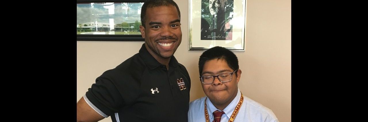 The Importance of Teachers Who Believe in Children With Disabilities a teacher standing with a student
