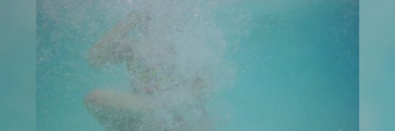 I Can't Make Myself Do What I Want to Do Because of Depression original photo by author of woman underwater trapped