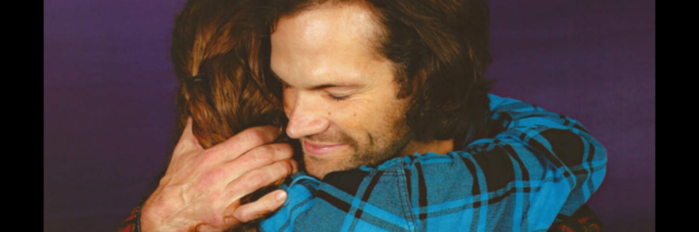 A woman hugs an actor from her favorite show Supernatural.