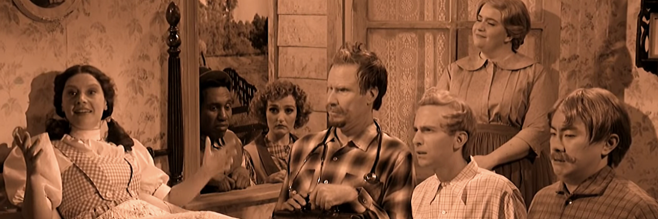 In 'Wizard of Oz' SNL Sketch, Will Ferrell Plays a Little Person Will Ferrel sitting by a bed, pretending to be a Little Person