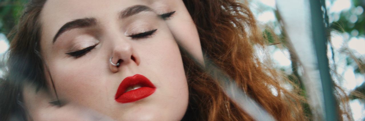 Borderline Personality Disorder and Avoidant Personality Disorder photo of woman reflected in three mirrors with eyes closed and reflection split three times