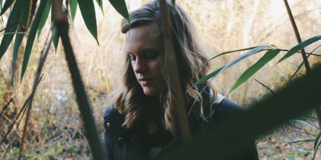 My Catastrophic Thoughts May Be Illogical, but Don't Call Me Dramatic artsy shot of a woman in a jungle/forest looking down between trees