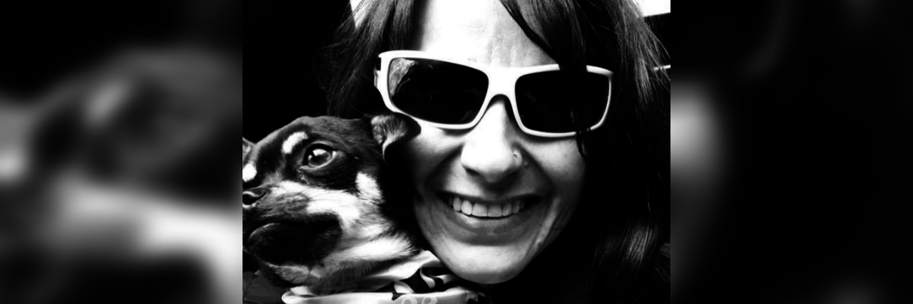 Starting Over After a Traumatic Brain Injury Kimberly with her support dog, Scout.