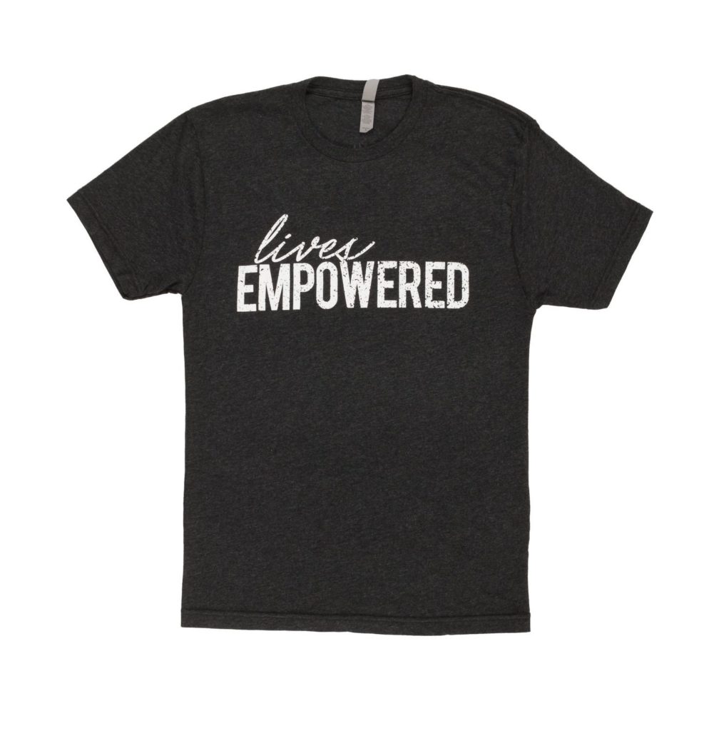 Black t-shirt that with the words "lives empowered" on it