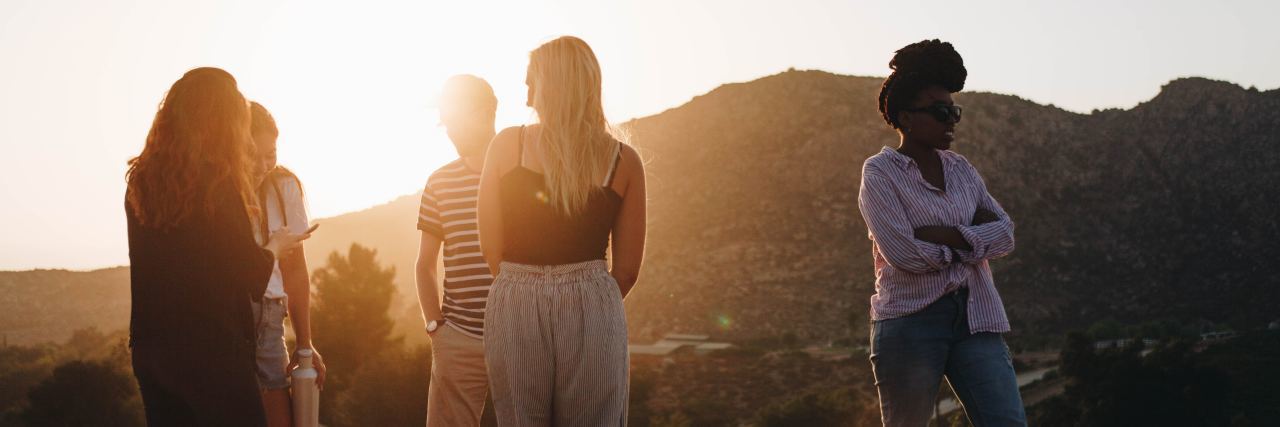 Why My Friends Are My Reason for Eating Disorder Recovery photo of five friends standing in hills at sunset