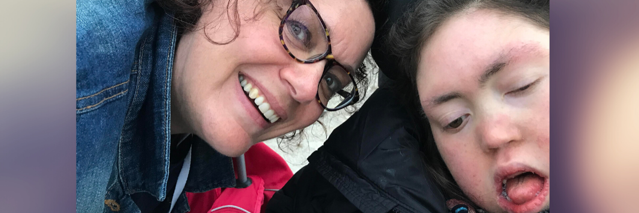 Overcoming PTSD as the Parent of a Child With Complex Medical Needs Michele smiling with her daughter.