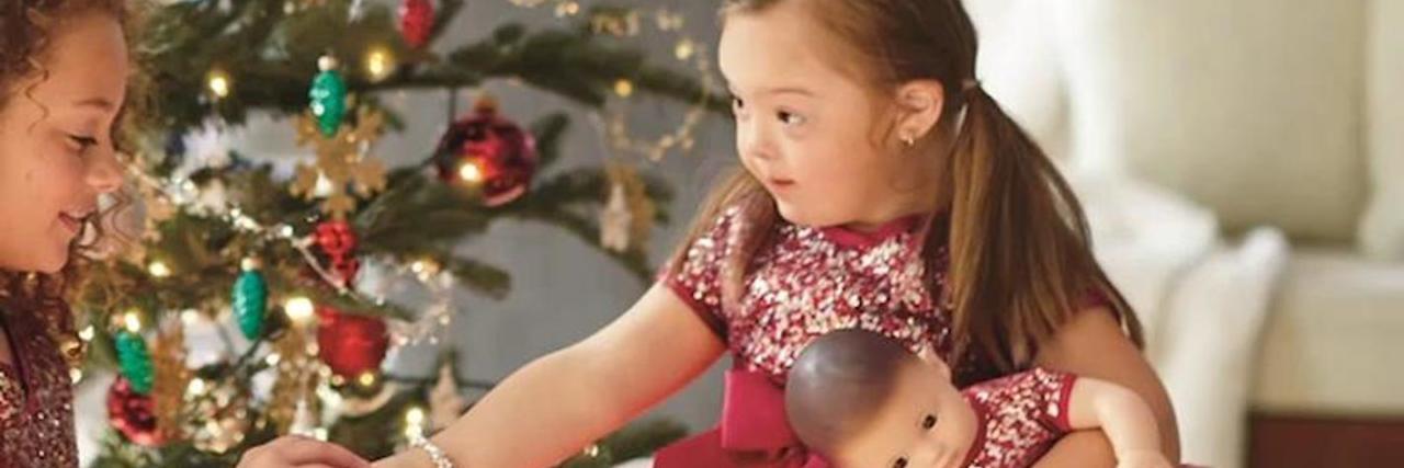 American Girl Features Model With Down Syndrome, But Won't Make a Doll Ivy Kimble modeling for American Girl
