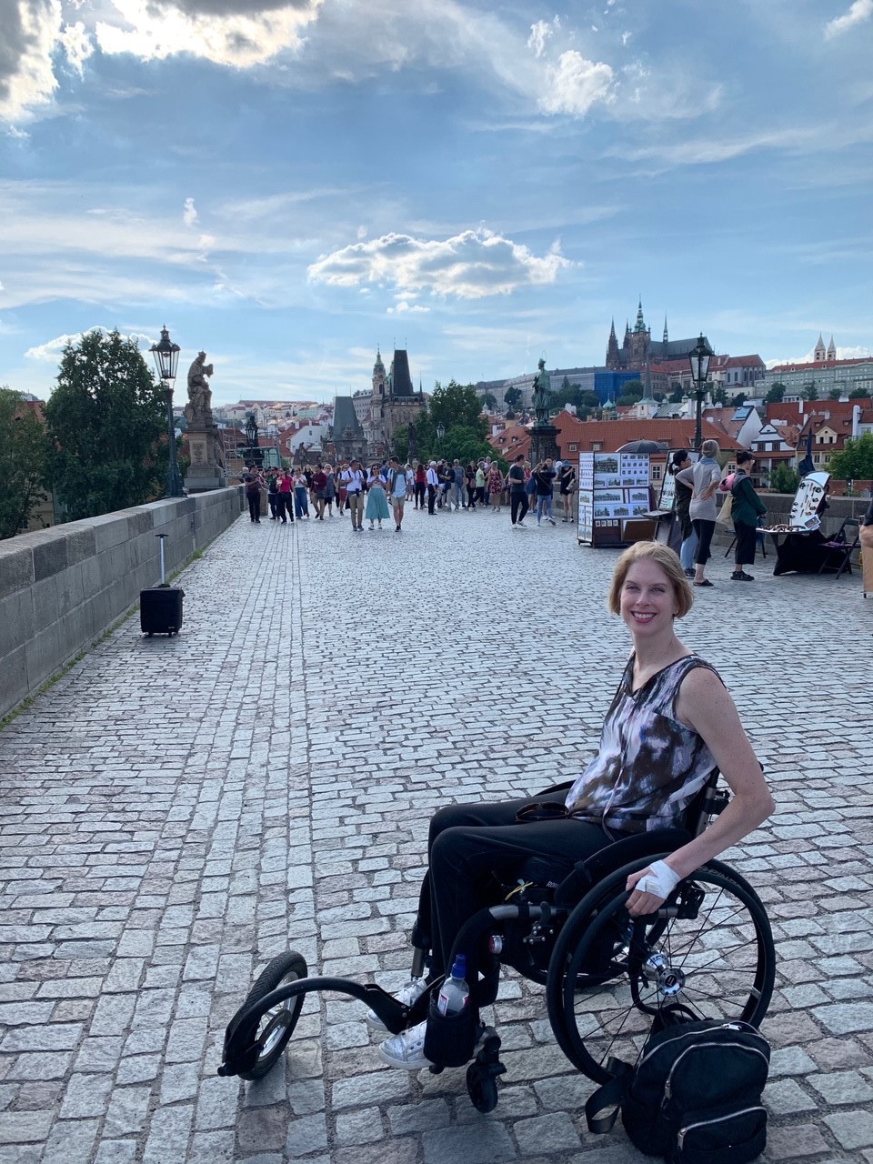 Jenny visiting Prague in her wheelchair.