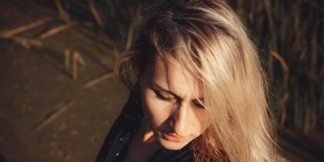 When Being ‘Tired’ Turns Into Fatigue After Encephalitis Woman with eyes closed.