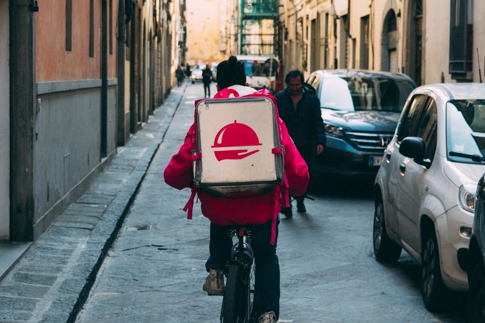 GrubHub bicycle delivery driver.