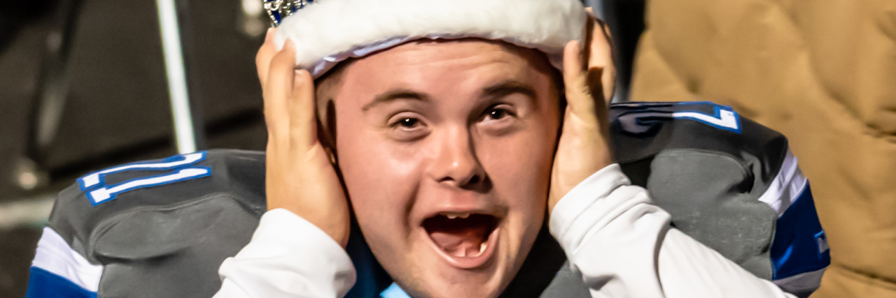 Including Children With Down Syndrome in High School Varsity Sports Caden Cox as he was crowned Homecoming King, the same night he won 'Player of the Game'.