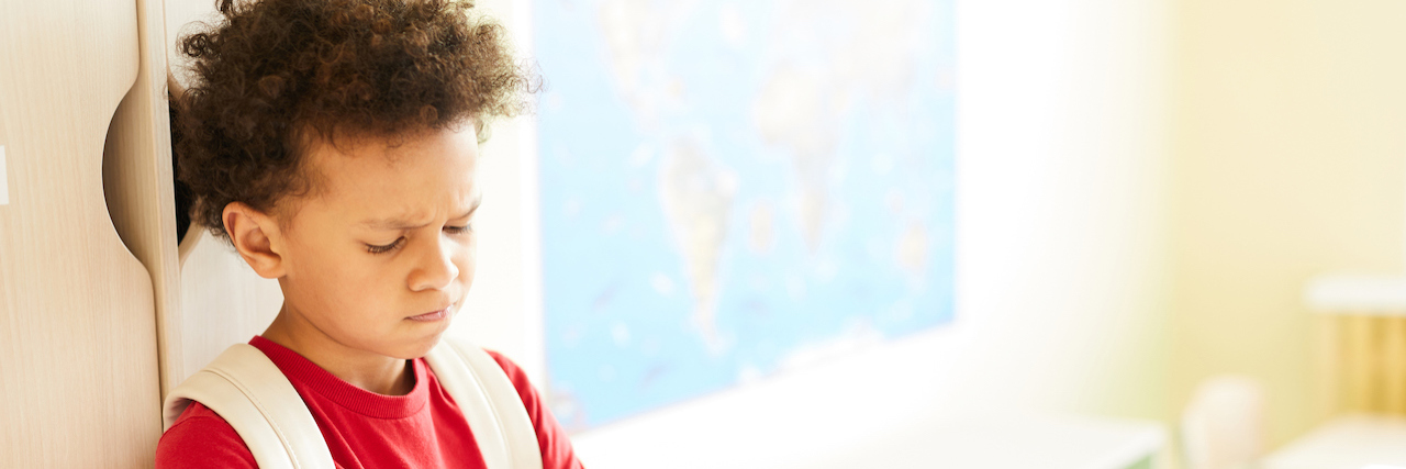 Study: Autistic Kids More Likely to Experience Chronic Pain Upset schoolboy at lockers