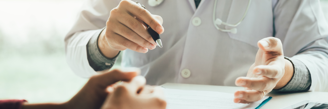 When Doctors Don't Know How to Treat Your Illness Doctor talking to the patient , focus on hands