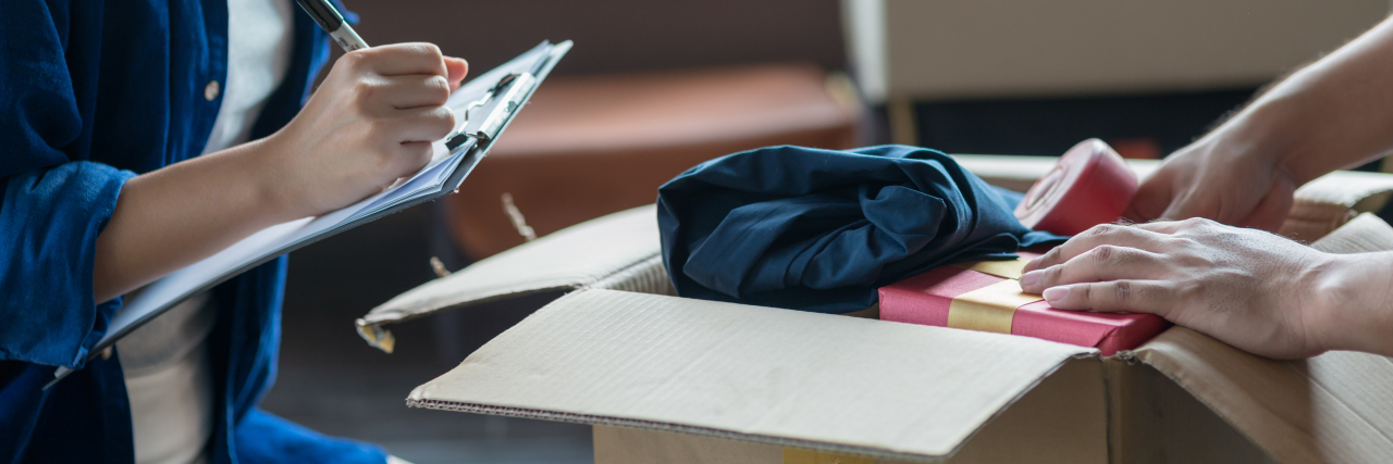 Worrying About the Safety of an Autistic Sibling Man and woman packing a moving box.