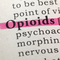 The word "opioid" highlighted in a book