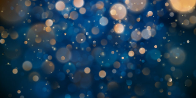 Abstract glitter defocused blinking stars and sparks.
