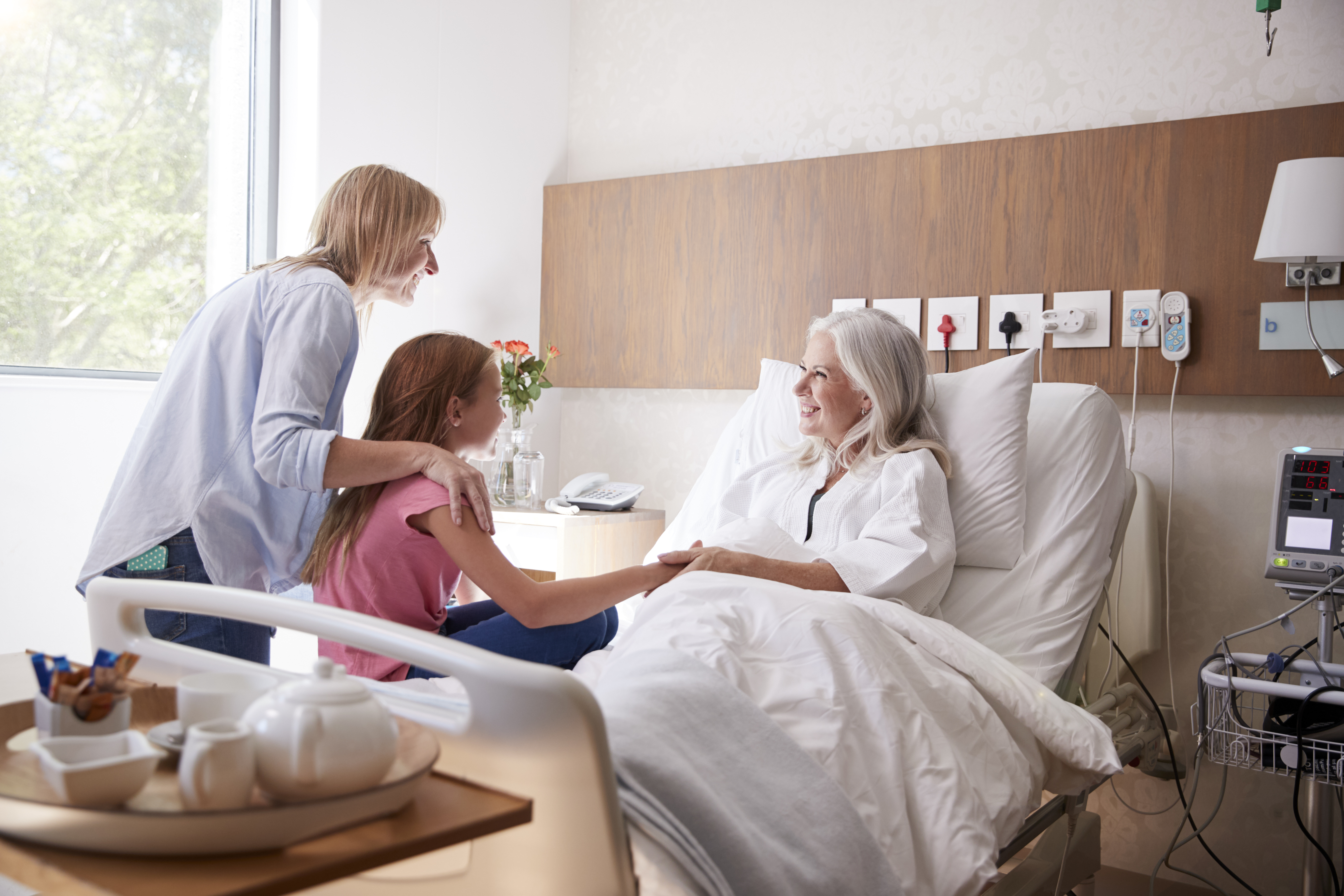 Family visiting loved one in the hospital.