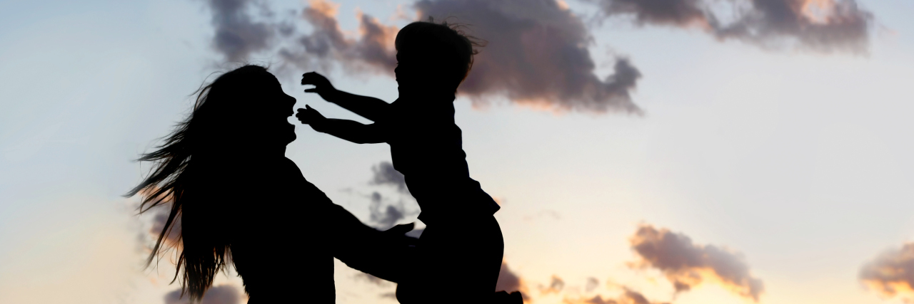 A Letter to My Son's Brain Tumor silhouette of a little boy running to his mom's arms shes smiling