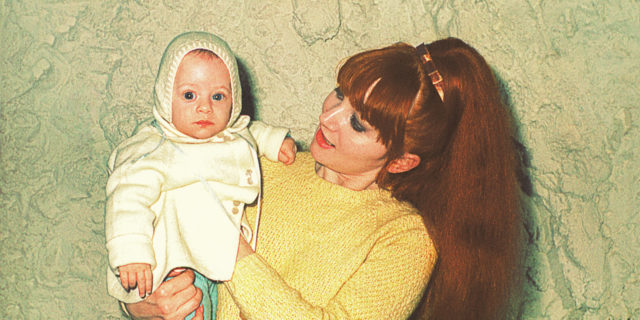 What It Was Like Growing Up With Cerebral Palsy in the 1960s Vintage photo from the 60s of a mother holding her cute little baby.