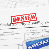 Denied stamp on Social Security Disability application form