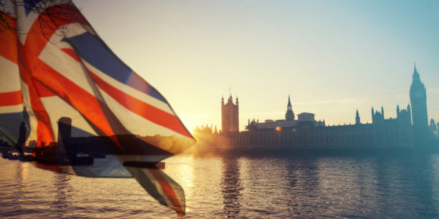 To Disabled People Who Feel Hopeless After the U.K. Election UK flag and Big Ben viewed from across the Thames.