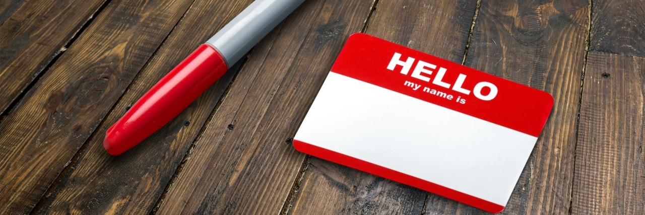 How Changing My Name Changed My Mental Health for the Better Hello My Name is Tag sitting on a table