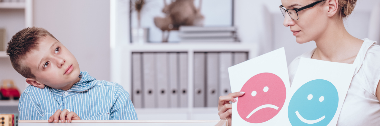 How Great Educators Supported My Autistic Son in School Therapist teaching autistic child.