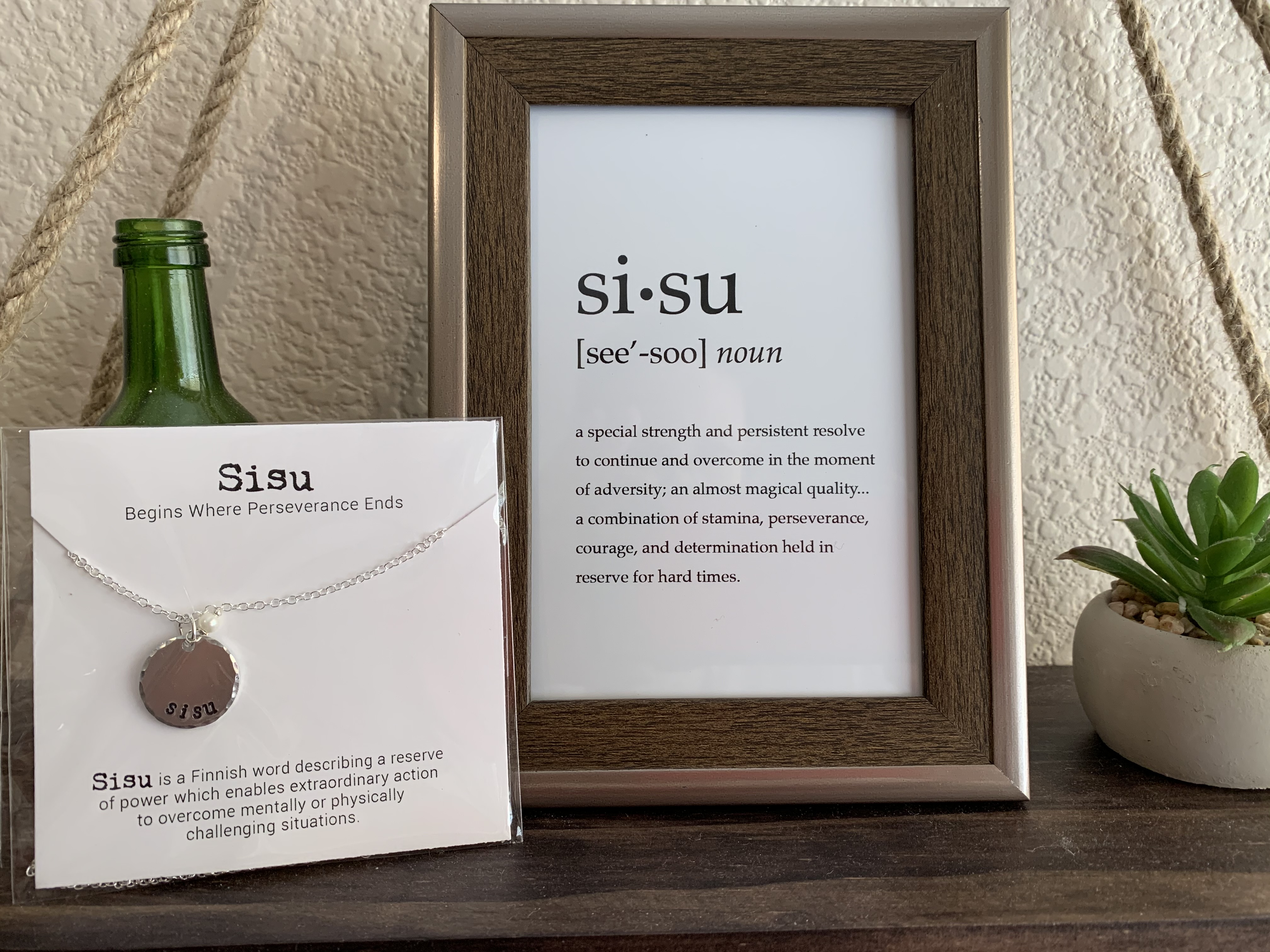 Sisu necklace and print.