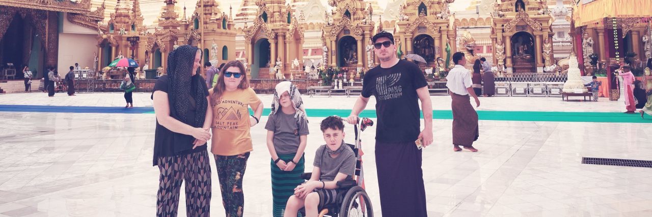 Exploring the World With My Son Who Has Cerebral Palsy Bronwyn's family outside a temple.