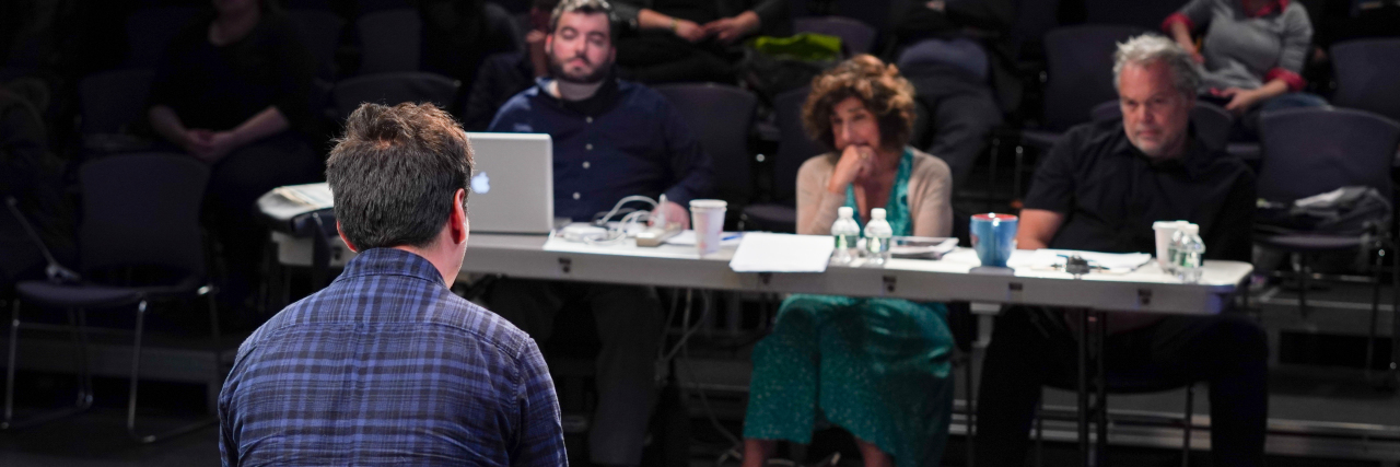 Vincent D'Onofrio Sits Down With Disabled Actors to Discuss Inclusion Actor Vincent D'Onofrio sitting with two other industry members evaluating the work of an actor. A man sits before them.