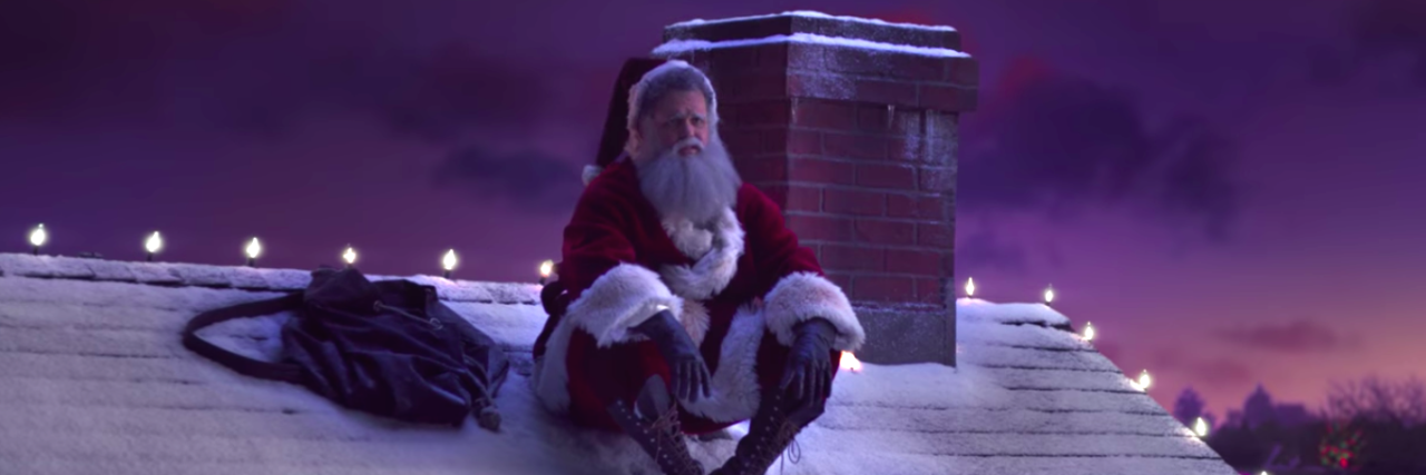 NAMI PSA Shows Santa Contemplating Ethics of 'Naughty vs. Nice' Santa sitting on roof