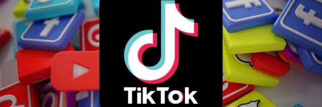 Pile of 3D Popular Social Media Logos with TikTok logo in the center