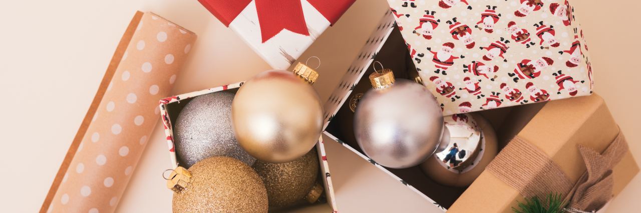 Why Holiday Decorations Might Worsen Things for Someone With Dementia boxes of ornaments and wrapping paper