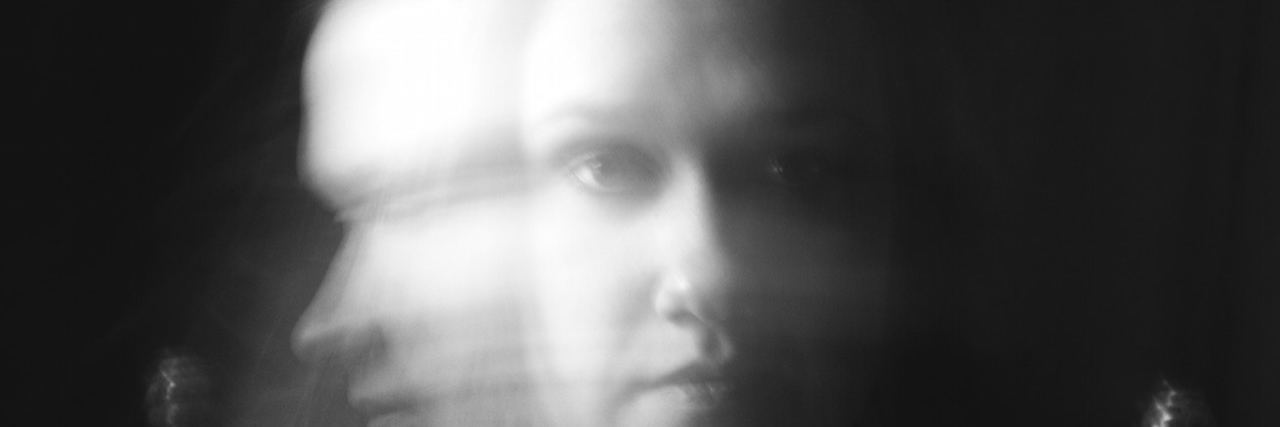 Living in Fear — the Cost of Surviving Complex PTSD Blurred image of woman looking at and away from camera