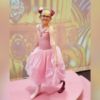 Callie dressed in her pink ballet outfit.