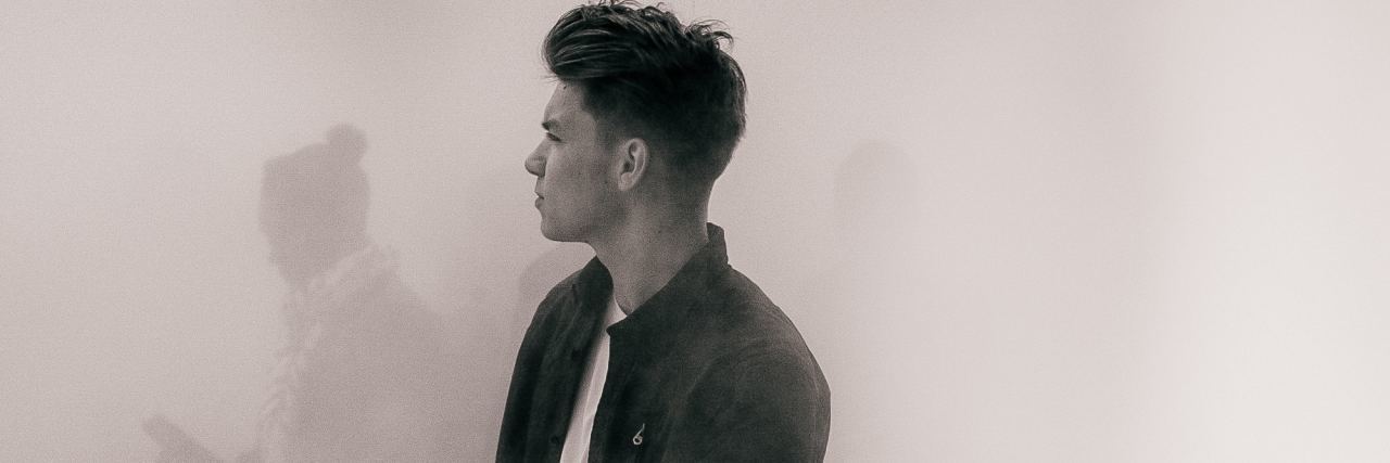 Why Navigating the Mental Health System Is So Hard A black and white photo of a man in smoke