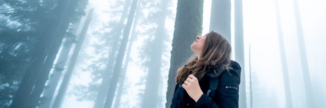 Ketamine Nasal Spray Helped My Treatment-Resistant Bipolar Depression photo of woman looking up in foggy winter Sequoia National Park
