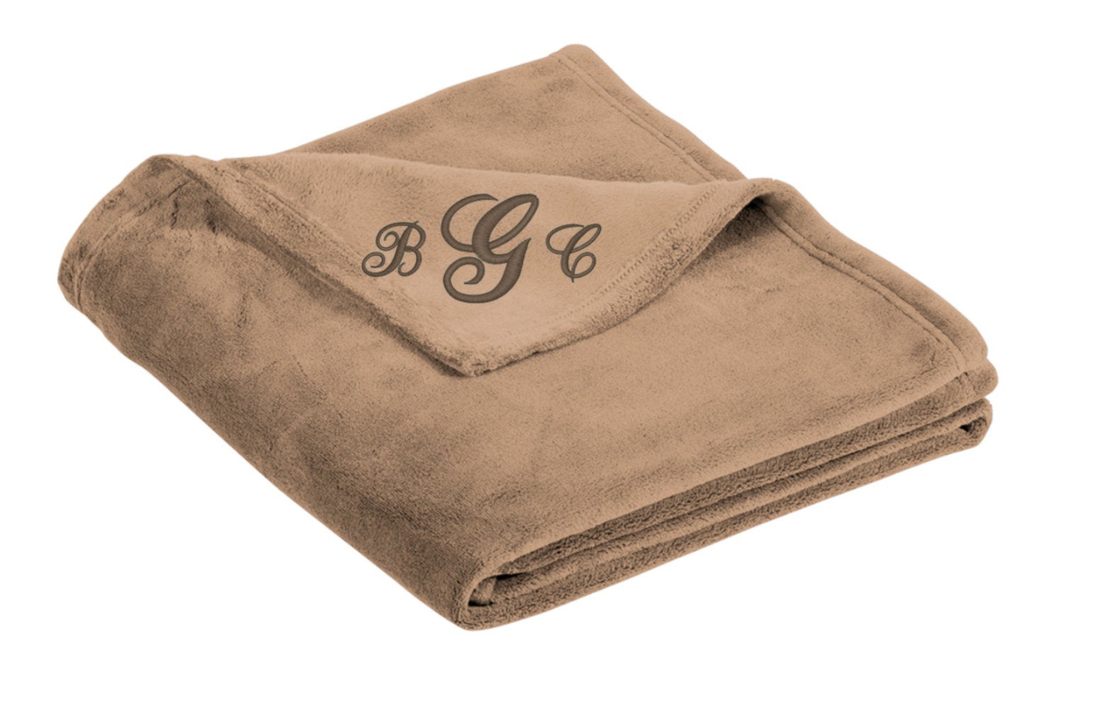 Personalized blanket with initials.