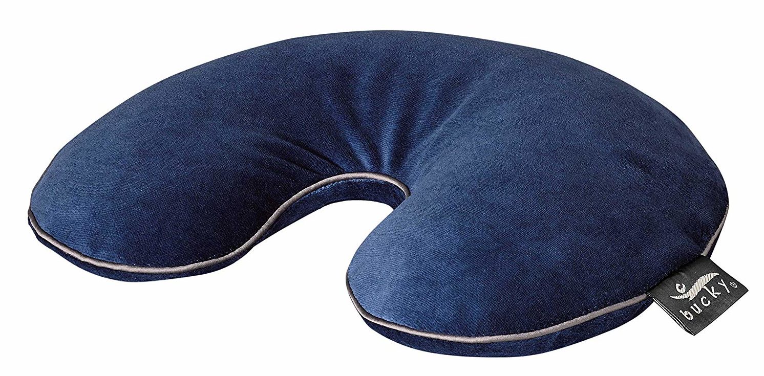 Blue U-shaped pillow for arthritis pain relief.